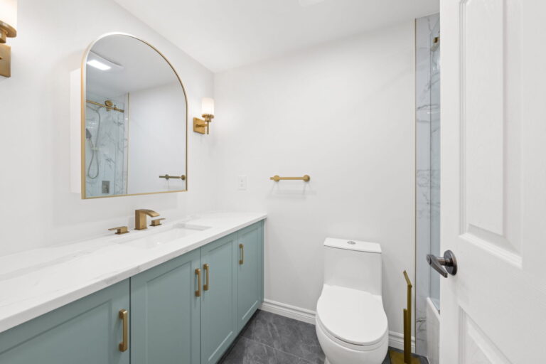small bathroom renovation with sage green vanity